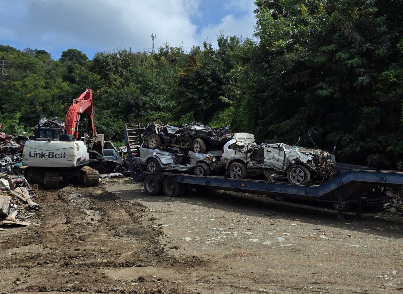 An image showing a trucks loading hazadrous cars